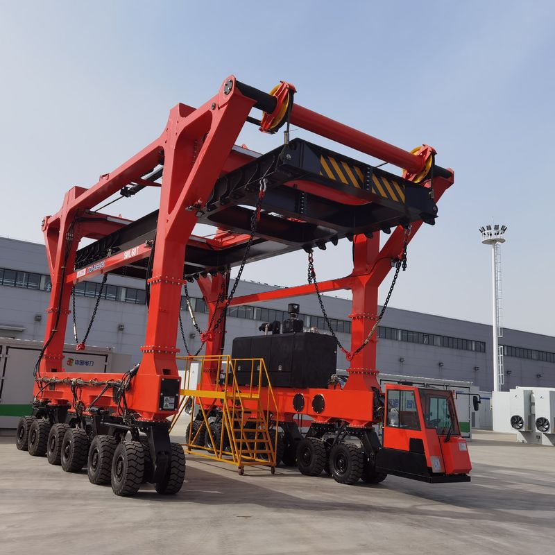 60 camiones 7km/h de Ton Straddle Lift Crane Carrier para las cargas de gran tamaño de elevación